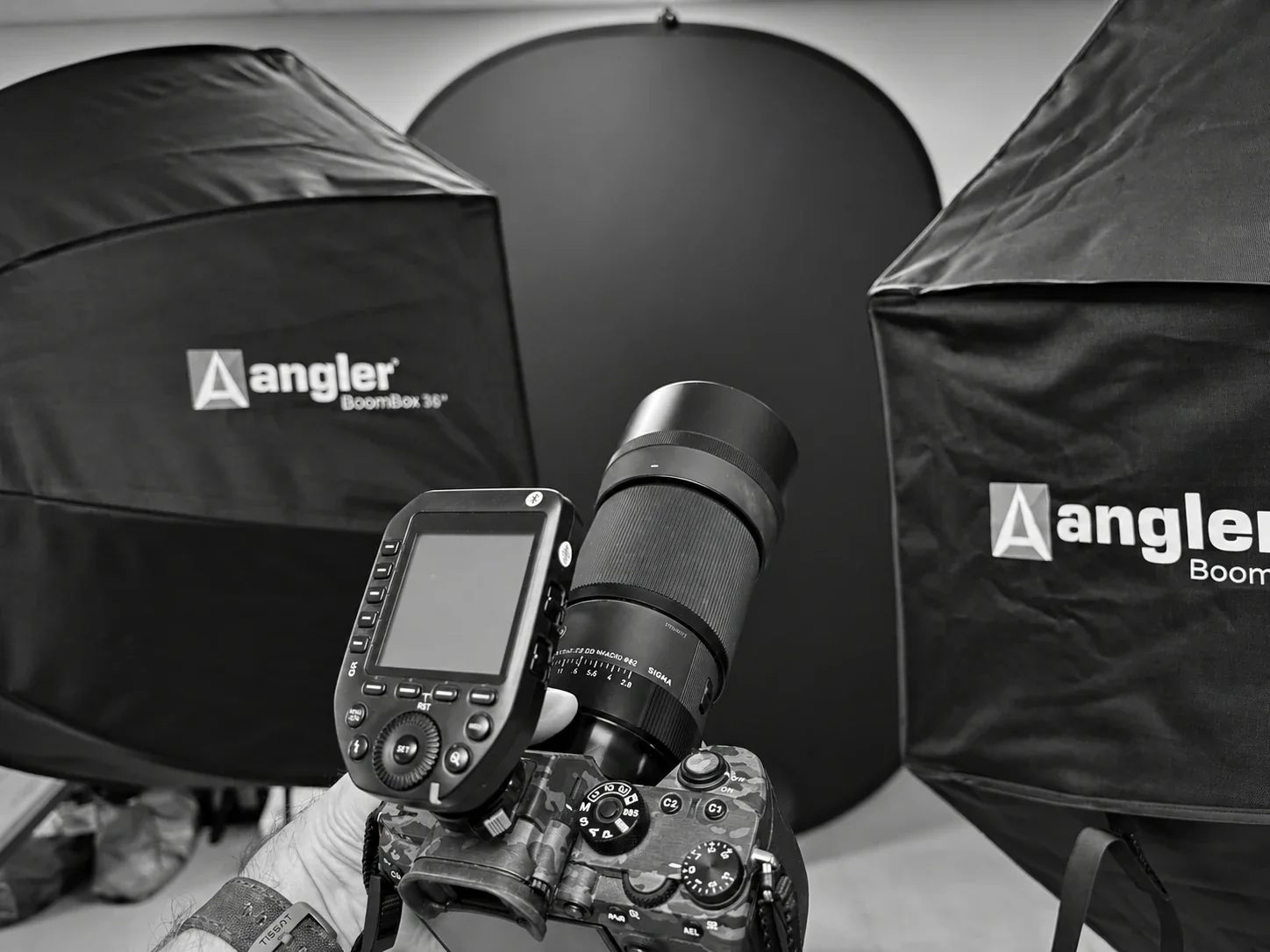 Black-and-white photo of BIOPRIME's camera, macro lens, and studio lighting